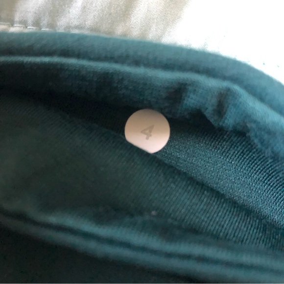 Lululemon essential rhythm pant leggings in deep green with mesh leg detail - Picture 4 of 5